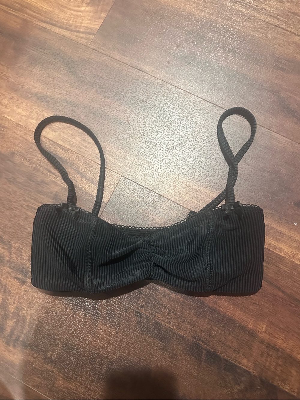 Frankie’s Bikinis black bathing suit top